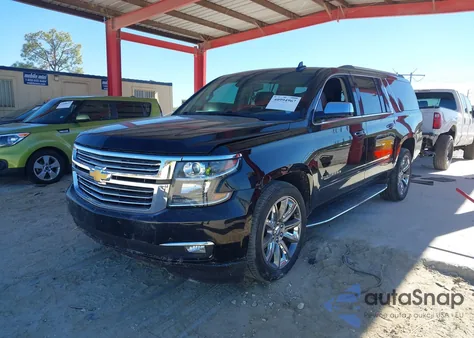 2018 Chevrolet Suburban K1500 Premier z USA, uszkodzony, nr VIN 1GNSKJKCXJR290901